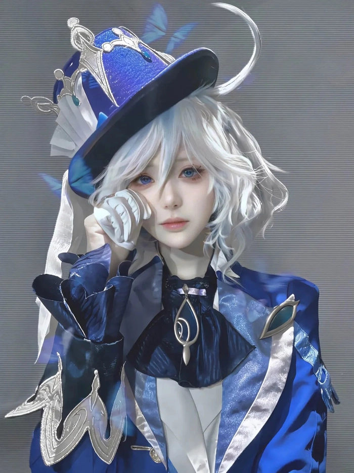 Gái xinh cosplay Genshin Impact với tóc trắng