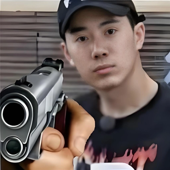 meme cầm súng bắn