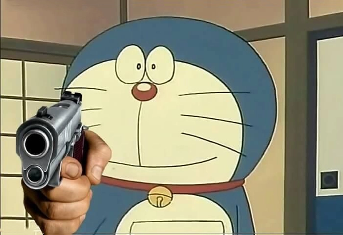 Meme Doraemon cười vui tươi dễ thương